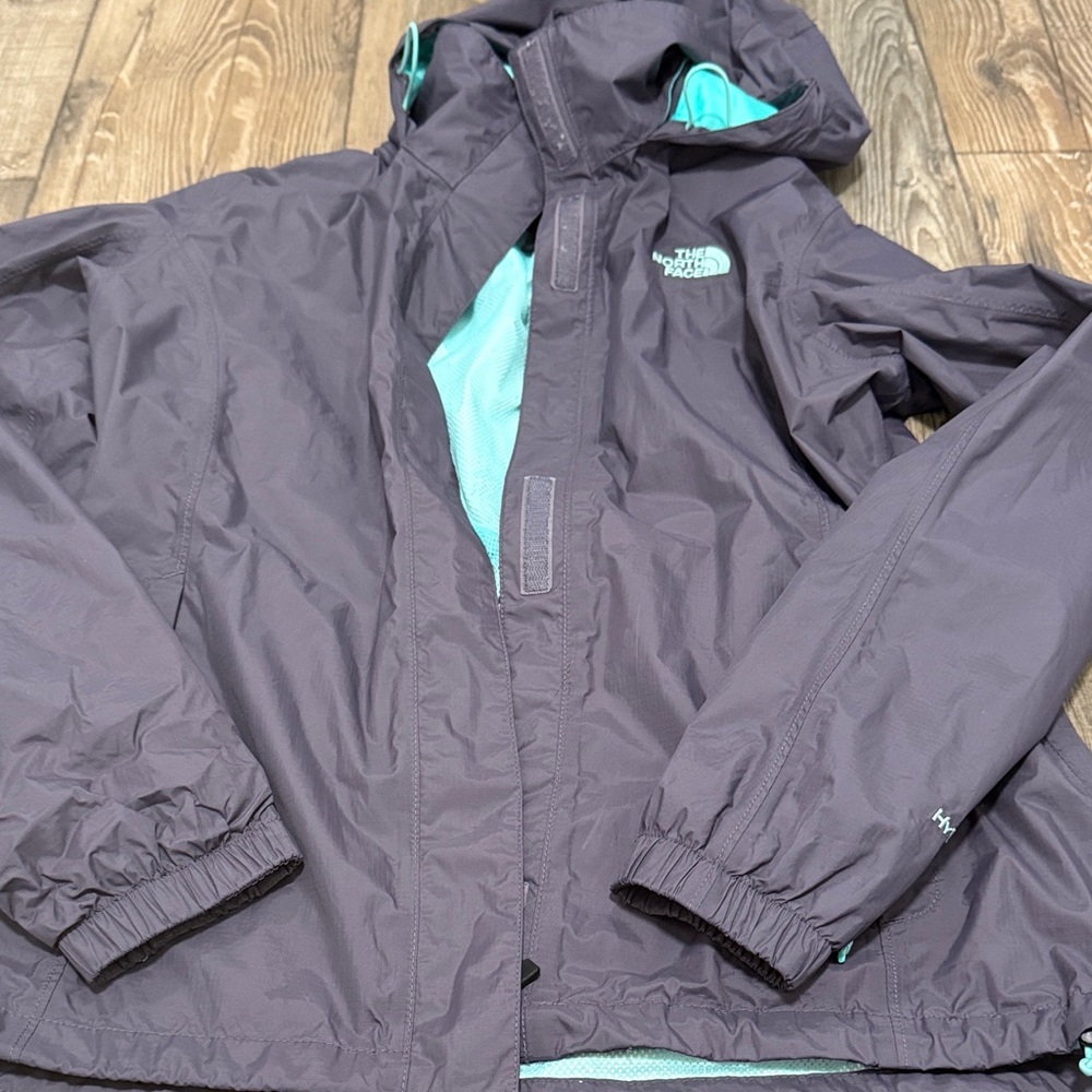 The North Face Charcoal and Mint rain jacket